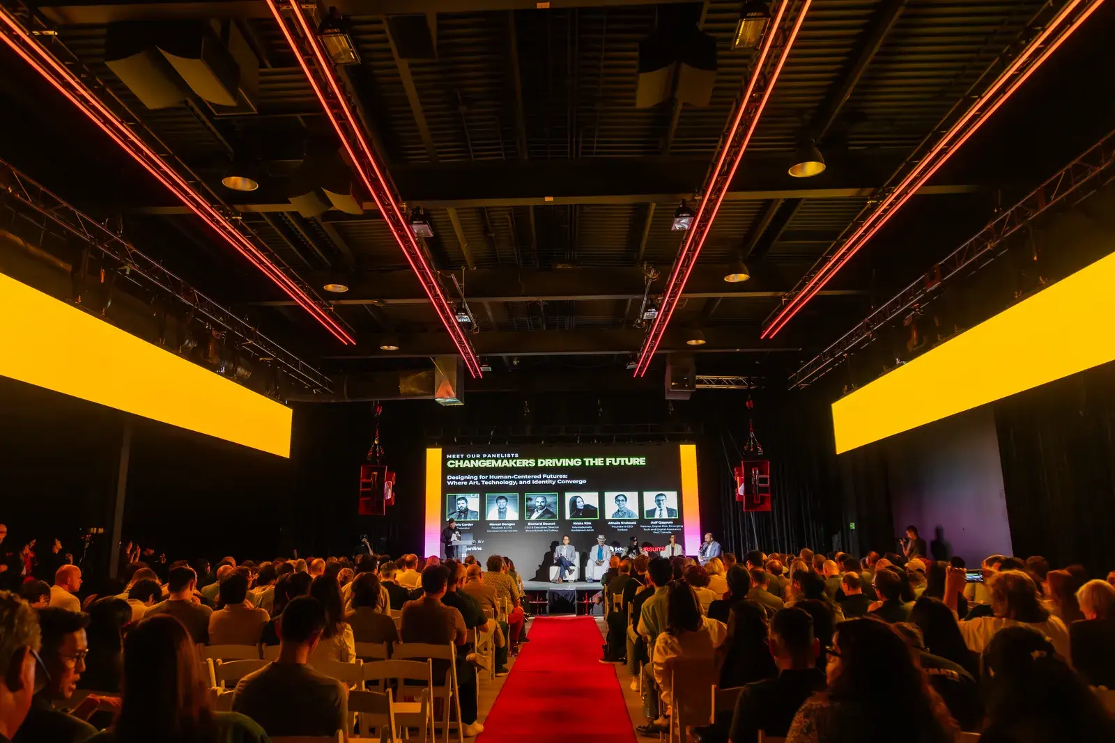 Conference stage at Demo Room with yellow LED walls